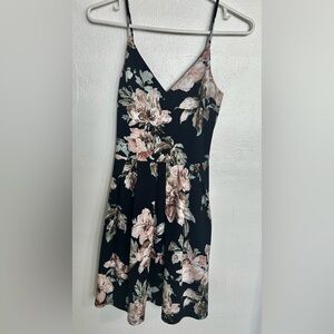 Mini dress color navy blue with flowers size small new with tag.